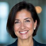 Professional headshot of Maria Rodriguez, CEO of GoMo, smiling confidently.